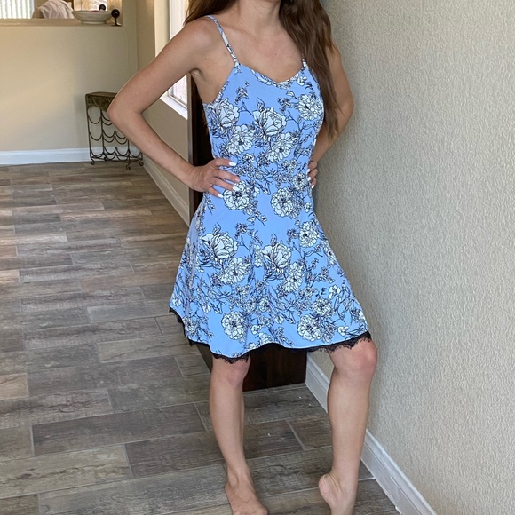 white sundress with blue flowers